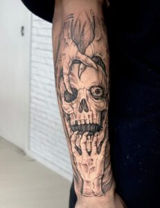 Mãos de fantasma com um crânio estilo bakcwork